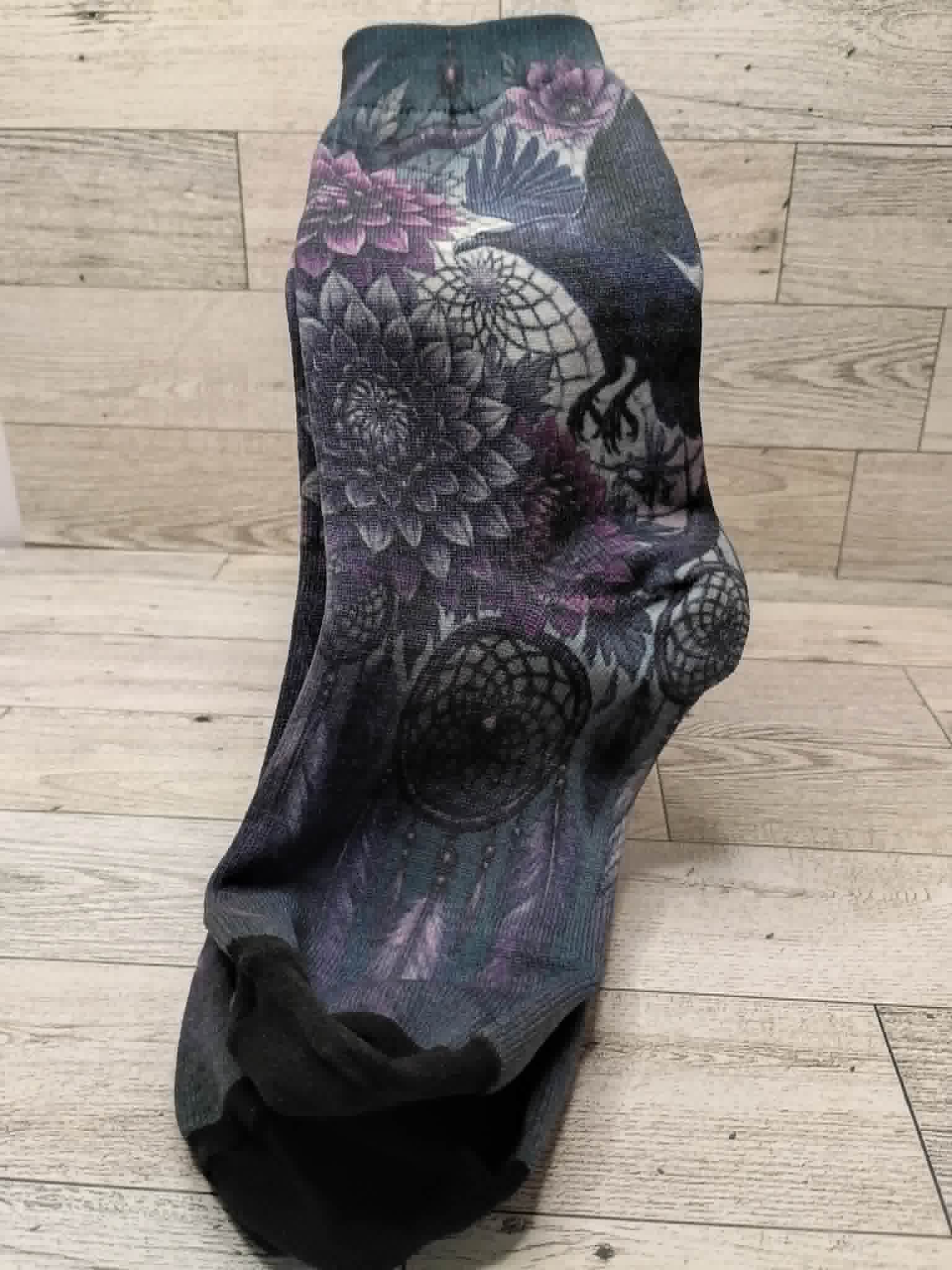 Raven socks on a desk