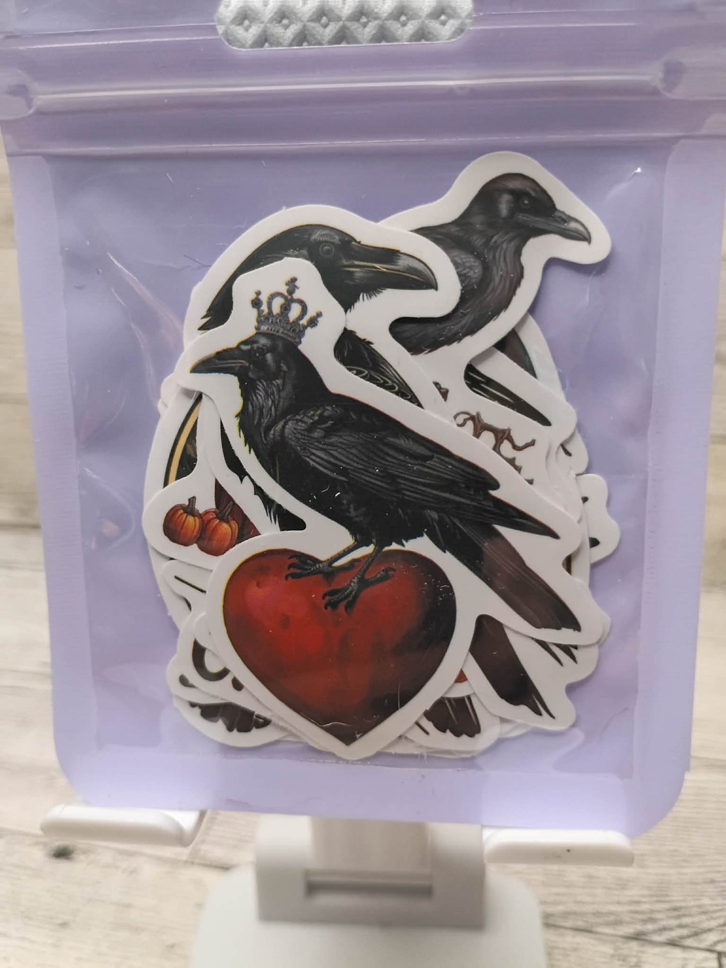 raven stickers in a bag