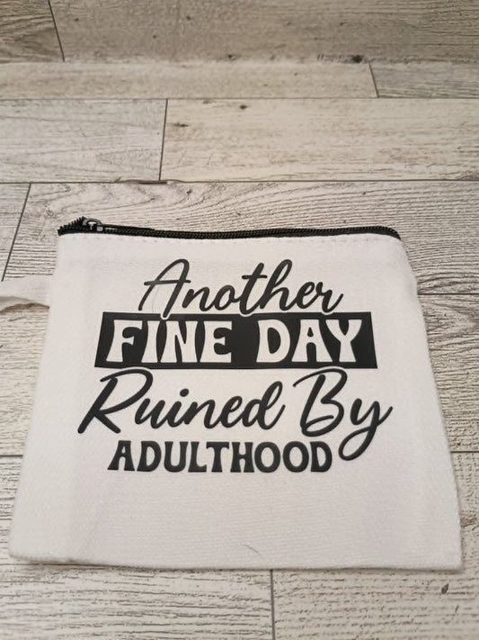 coin purse on wood floor